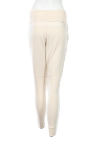 Női sport nadrág Uniqlo, Méret M, Szín Ekrü
, Ár 8 779 Ft