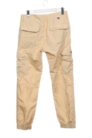 Férfi nadrág Tommy Jeans, Méret M, Szín Bézs, Ár 44 009 Ft