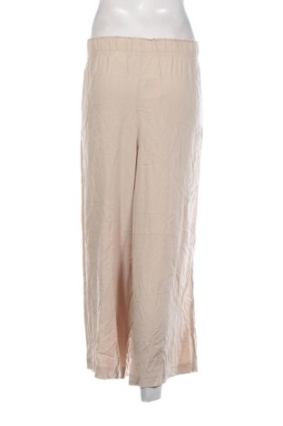 Damskie spodnie H&M, Rozmiar L, Kolor Beżowy, Cena 78,99 zł