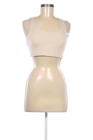 Damski sportowy top H&M, Rozmiar M, Kolor Beżowy, Cena 41,11 zł