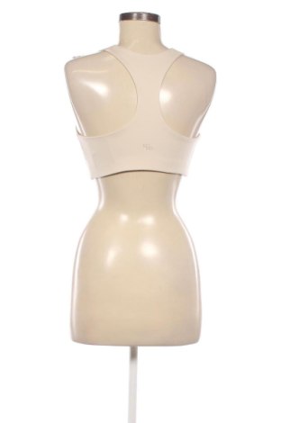 Damski sportowy top H&M, Rozmiar M, Kolor Beżowy, Cena 41,11 zł