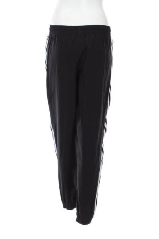 Damskie spodnie sportowe Adidas, Rozmiar M, Kolor Czarny, Cena 112,53 zł