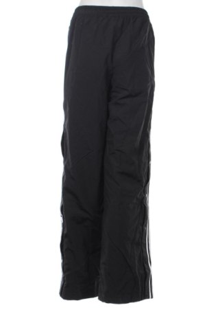 Damskie spodnie sportowe Adidas Originals, Rozmiar XL, Kolor Czarny, Cena 250,99 zł