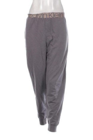 Damskie spodnie sportowe Calvin Klein, Rozmiar M, Kolor Popielaty róż, Cena 201,99 zł, #135998645