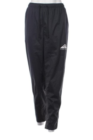 Damskie spodnie sportowe Nike, Rozmiar XL, Kolor Kolorowy, Cena 110,99 zł