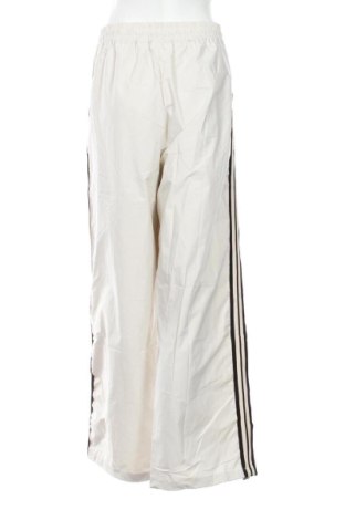 Damskie spodnie sportowe Unbranded, Rozmiar XL, Kolor Beżowy, Cena 80,38 zł