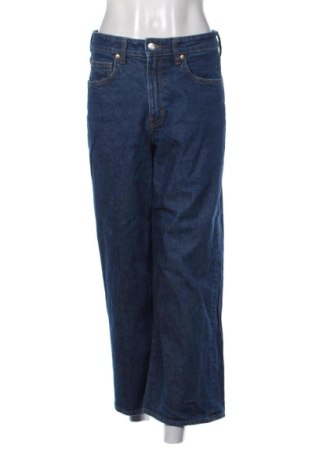 Damskie jeansy H&M, Rozmiar M, Kolor Niebieski, Cena 80,38 zł