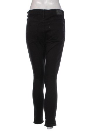 Damskie jeansy Levi's, Rozmiar L, Kolor Czarny, Cena 205,57 zł