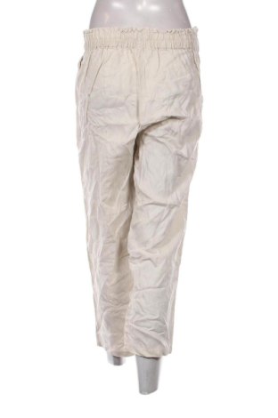 Damskie spodnie Flash Woman, Rozmiar L, Kolor Beżowy, Cena 78,99 zł