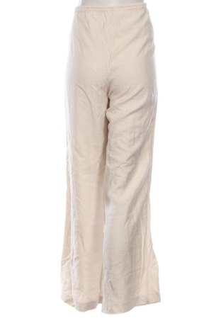 Damskie spodnie H&M, Rozmiar M, Kolor Beżowy, Cena 79,15 zł