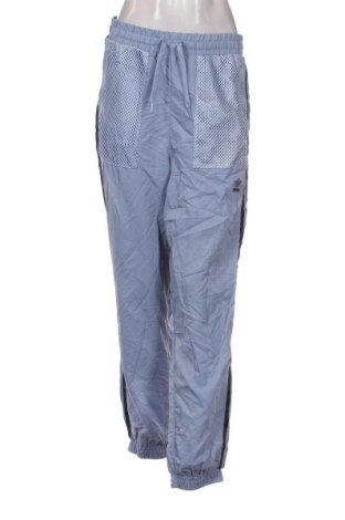 Damskie spodnie sportowe Adidas Originals, Rozmiar L, Kolor Niebieski, Cena 110,99 zł