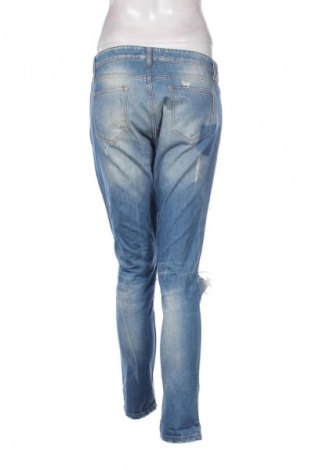 Damskie jeansy United Colors Of Benetton, Rozmiar M, Kolor Niebieski, Cena 21,99 zł
