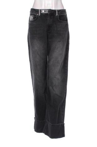 Damskie jeansy Debiflue x NA-KD, Rozmiar M, Kolor Czarny, Cena 112,00 zł, #136689975