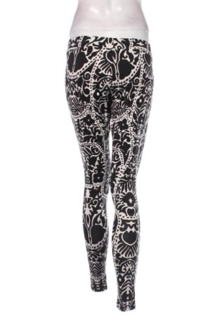 Dámské legíny  H&M, Velikost L, Barva Vícebarevné, Cena  399,00 Kč