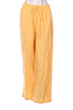 Damskie spodnie U.S. Polo Assn., Rozmiar M, Kolor Pomarańczowy, Cena 149,16 zł, #136756949