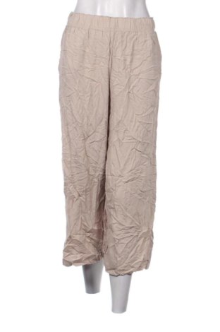 Damskie spodnie H&M, Rozmiar M, Kolor Beżowy, Cena 52,99 zł, #136759640