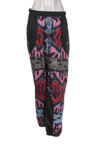 Damskie spodnie sportowe Nike, Rozmiar M, Kolor Kolorowy, Cena 110,99 zł, #136685155