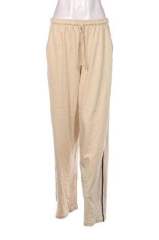 Damskie spodnie sportowe TCM, Rozmiar L, Kolor Beżowy, Cena 78,99 zł