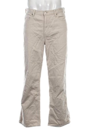 Męskie jeansy Uniqlo, Rozmiar M, Kolor Beżowy, Cena 65,99 zł, #136744710