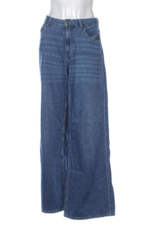 Damskie jeansy Bershka, Rozmiar L, Kolor Niebieski, Cena 76,99 zł, #136682708