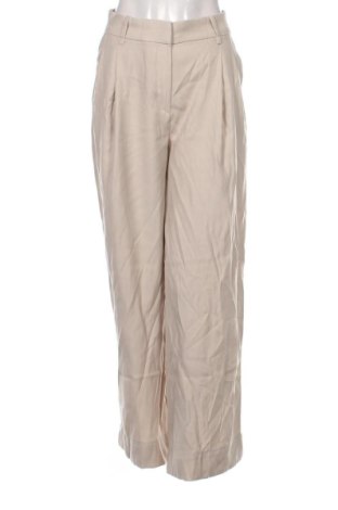 Damskie spodnie H&M, Rozmiar M, Kolor Beżowy, Cena 54,99 zł, #136790722