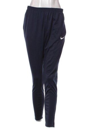Pantaloni trening de femei Nike, Mărime M, Culoare Albastru, Preț 117,99 Lei, #136767216