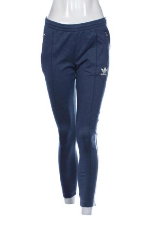 Damskie spodnie sportowe Adidas, Rozmiar M, Kolor Niebieski, Cena 93,99 zł, #136770753