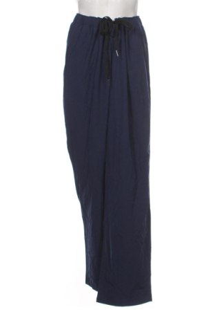 Damskie spodnie sportowe Unbranded, Rozmiar XL, Kolor Niebieski, Cena 48,99 zł, #136834842