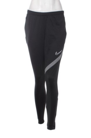 Дамско спортно долнище Nike, Размер M, Цвят Черен, Цена 27,09 €, #136844347