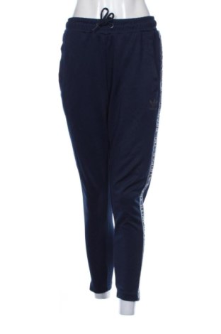 Damskie spodnie sportowe Adidas, Rozmiar M, Kolor Niebieski, Cena 93,99 zł, #136711648