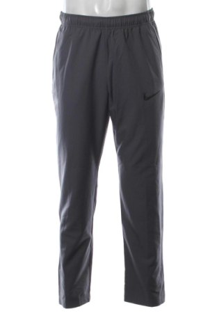 Męskie spodnie sportowe Nike, Rozmiar M, Kolor Szary, Cena 135,99 zł, #136860807