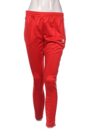 Damskie spodnie sportowe Adidas, Rozmiar M, Kolor Czerwony, Cena 150,99 zł, #136867677