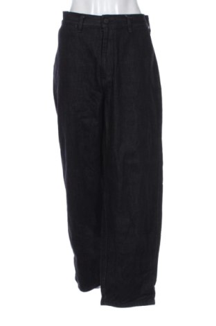 Damskie jeansy Uniqlo, Rozmiar XL, Kolor Czarny, Cena 150,04 zł, #136957934