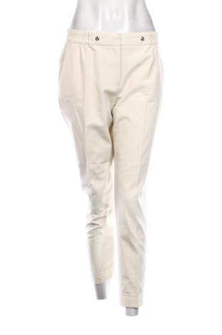 Damskie spodnie Unbranded, Rozmiar M, Kolor ecru, Cena 37,51 zł, #136972353