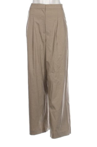 Damskie spodnie H&M, Rozmiar L, Kolor Beżowy, Cena 70,99 zł, #137018134