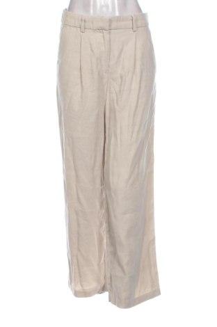 Damskie spodnie H&M, Rozmiar M, Kolor Beżowy, Cena 62,10 zł, #137033299