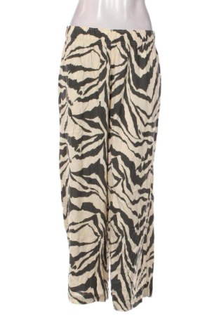 Damskie spodnie H&M, Rozmiar L, Kolor Kolorowy, Cena 139,32 zł, #136948306