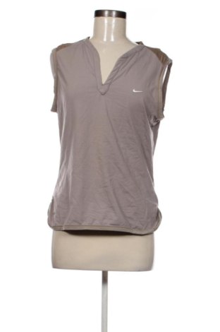 Дамски спортен топ Nike, Размер L, Цвят Кафяв, Цена 20,45 €, #136991362