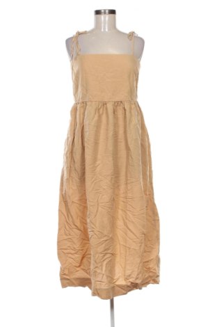Рокля Uniqlo, Размер M, Цвят Бежов, Цена 28,63 €, #137042448