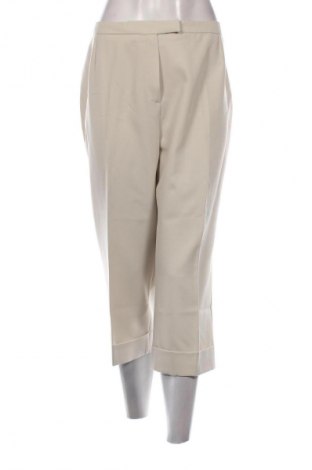 Damskie spodnie Marks & Spencer, Rozmiar L, Kolor Beżowy, Cena 29,99 zł