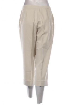 Damskie spodnie Marks & Spencer, Rozmiar L, Kolor Beżowy, Cena 29,99 zł