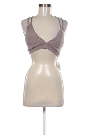 Damski sportowy top Unbranded, Rozmiar M, Kolor Beżowy, Cena 29,63 zł, #136969696
