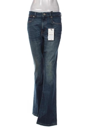 Damskie jeansy Zara, Rozmiar L, Kolor Niebieski, Cena 66,14 zł, #137249408