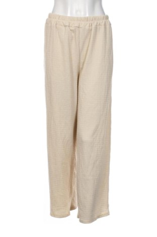 Damskie spodnie Unbranded, Rozmiar M, Kolor ecru, Cena 49,99 zł, #137143987