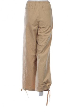 Γυναικείο παντελόνι Karl Kani, Μέγεθος L, Χρώμα  Μπέζ, Τιμή 5,99 €