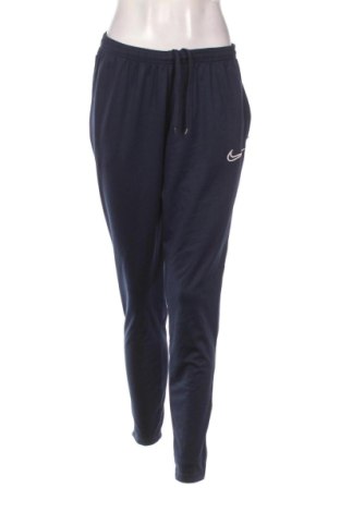 Pantaloni trening de femei Nike, Mărime M, Culoare Albastru, Preț 295,77 Lei, #137258649