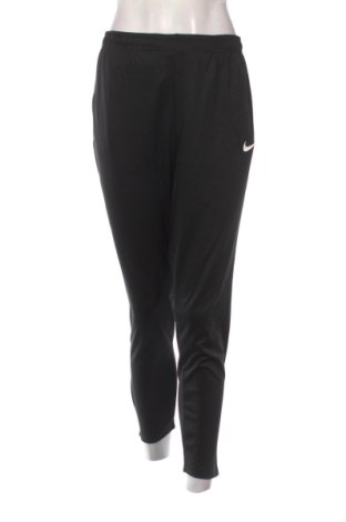 Pantaloni trening de femei Nike, Mărime XL, Culoare Negru, Preț 259,99 Lei, #137262362