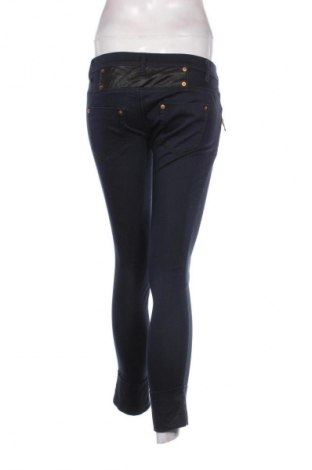 Damskie spodnie United Colors Of Benetton, Rozmiar L, Kolor Niebieski, Cena 22,99 zł