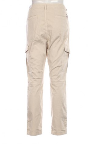 Ανδρικό παντελόνι Tommy Jeans, Μέγεθος M, Χρώμα  Μπέζ, Τιμή 23,99 €