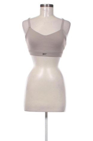 Top sport de damă. Reebok, Mărime M, Culoare Bej, Preț 78,74 Lei, #137280372